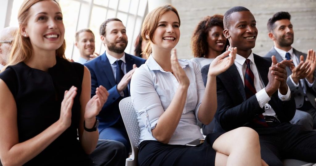 Audience-applauding-at-business-conference-1-1024x683