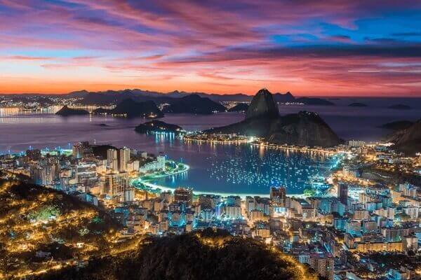 coucher de soleil rio de janeiro quelle langue parle t on au bresil Agence de traduction Paris